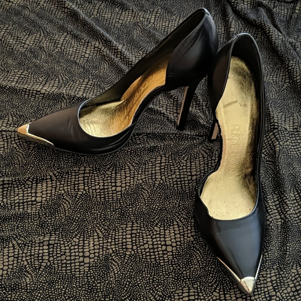 Black leather stilettos with gold tip